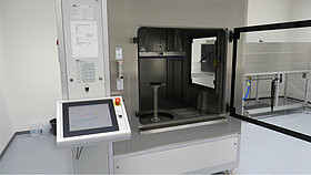 Spray water chamber with open door in the TQ Product Compliance Center