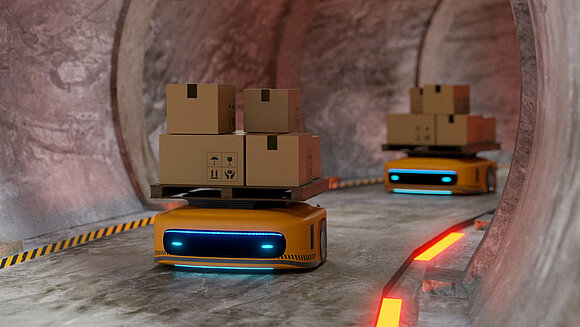 Roboter transportieren Pakete