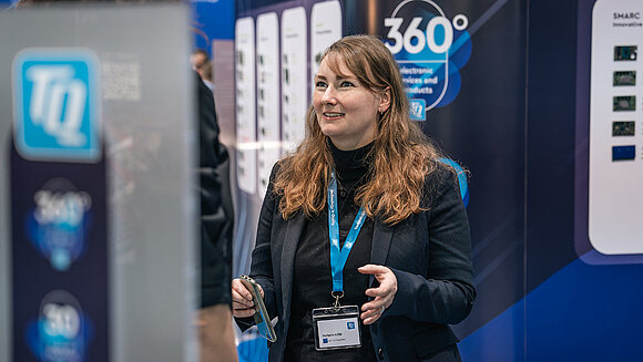 Stefanie Kölbl (Head of TQ-Embedded) at the trade fair stand
