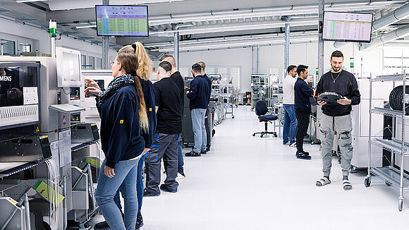 Employees in production on a production line