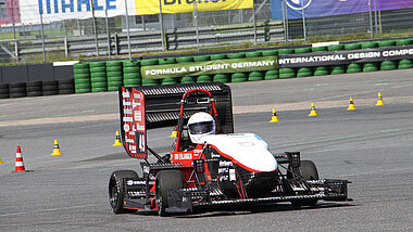 High Voltage racing car driving from the front