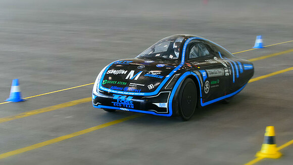 E-racing cars on the racetrack