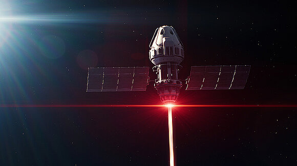 Satellite in the Dark with a Red Laser