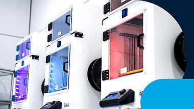 Three 3D printers next to each other