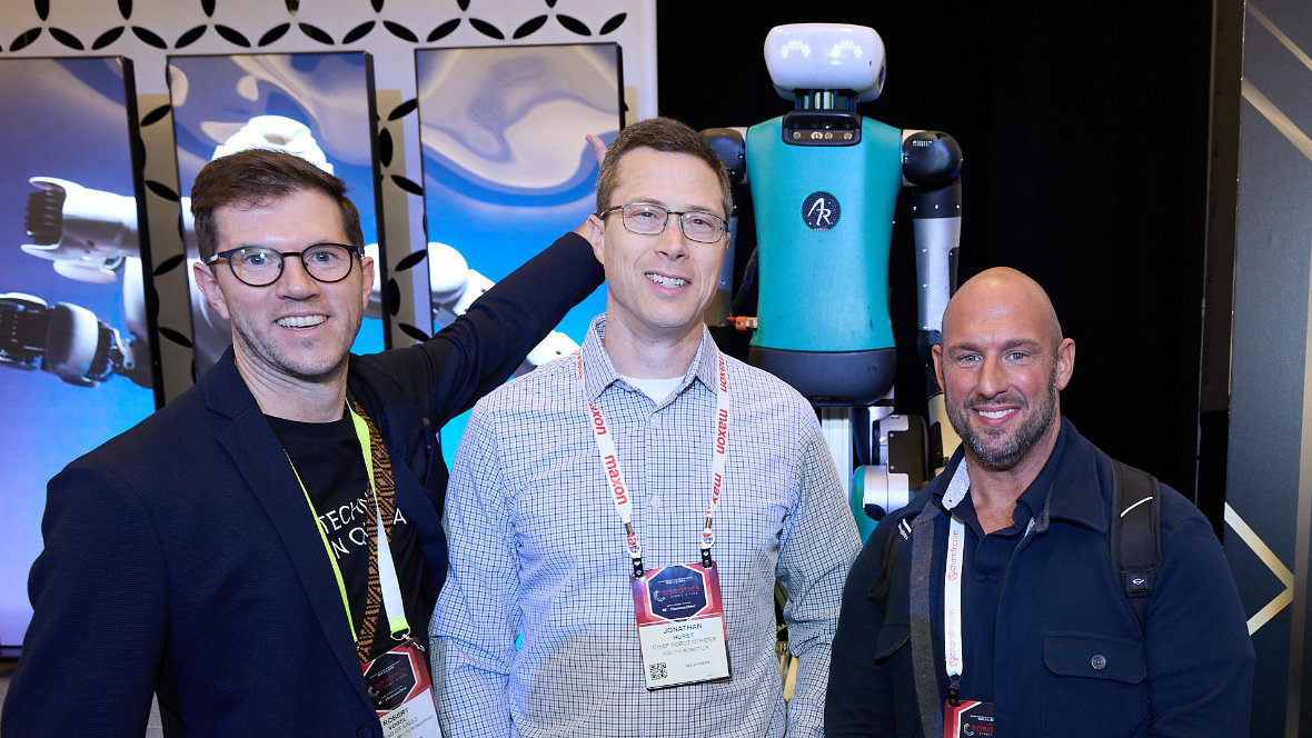 3 Personen auf dem Event RoboBusiness