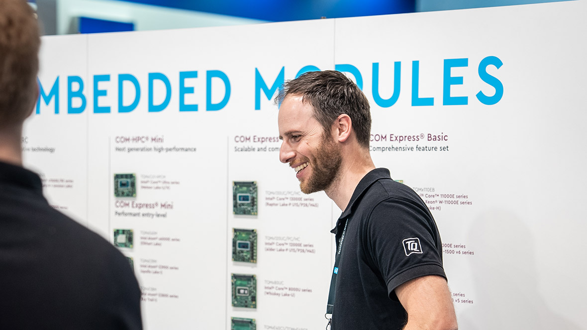 A person in front of an embedded module wall