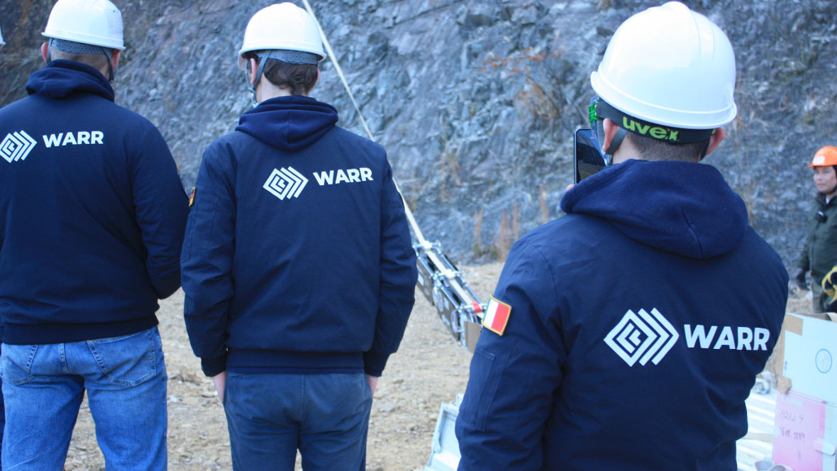 Three WARR employees in back view