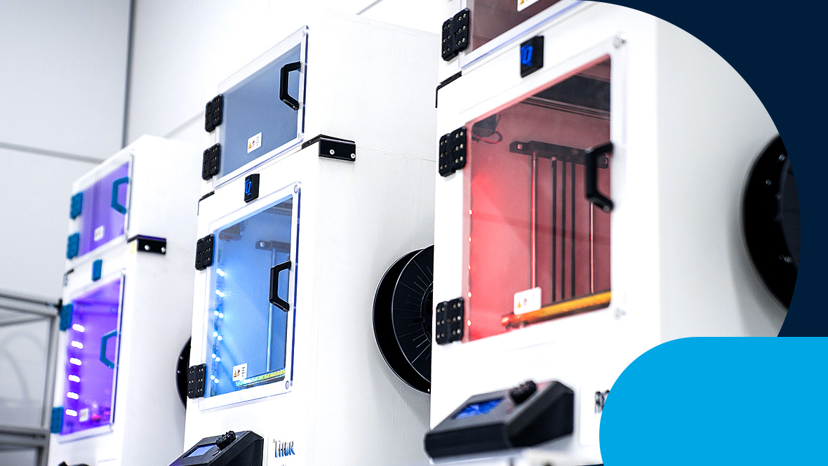 Three 3D printers next to each other
